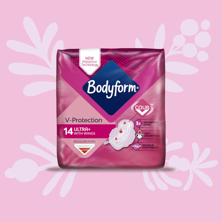 Bodyform Normal Ultra Towels with Wings 14 Pack in pink packaging, displayed upright on a pink background for daytime protection.