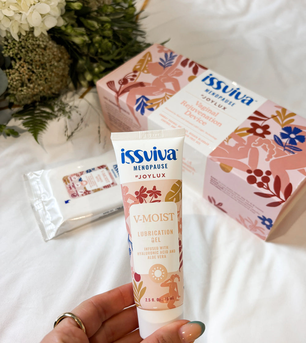 Woman holding Issviva product outdoors – promoting natural menopause support through daily wellness routines