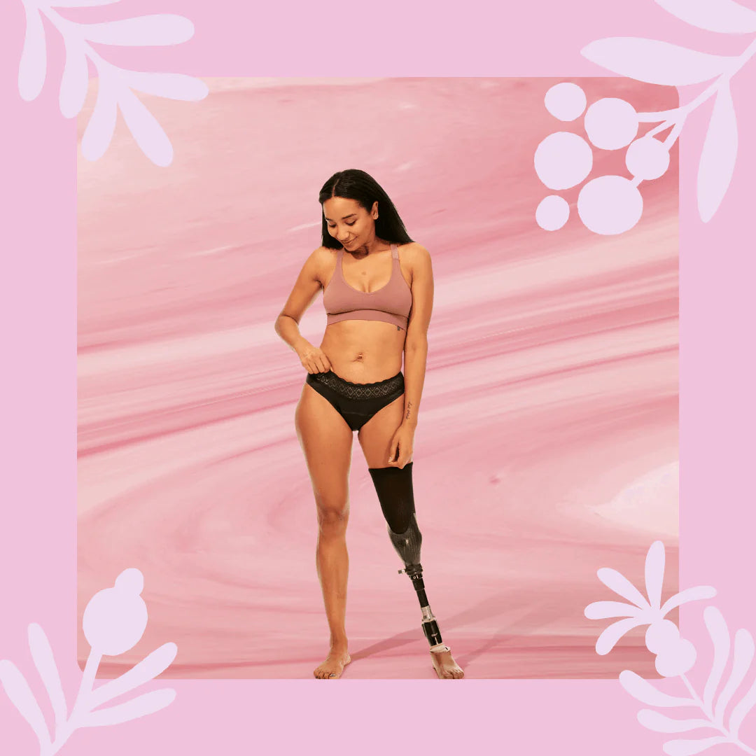 Woman wearing Bodyform Moderate Flow Washable Period Pants in black color, against a soft background.