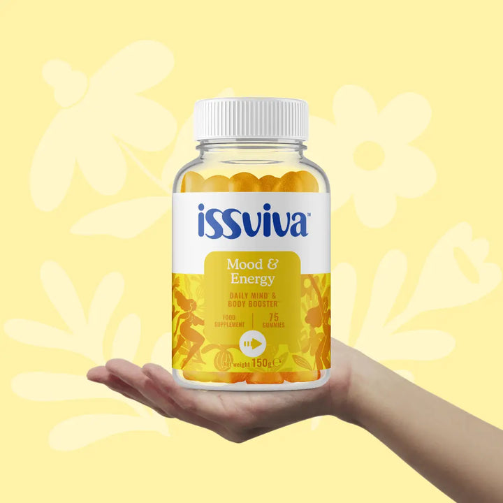 Issviva Mood & Energy Food Supplement with vibrant orange labels,  on a soft background.