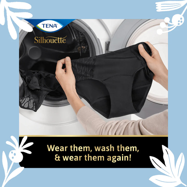 Hands holding TENA Black Classic Brief Washable Incontinence Underwear